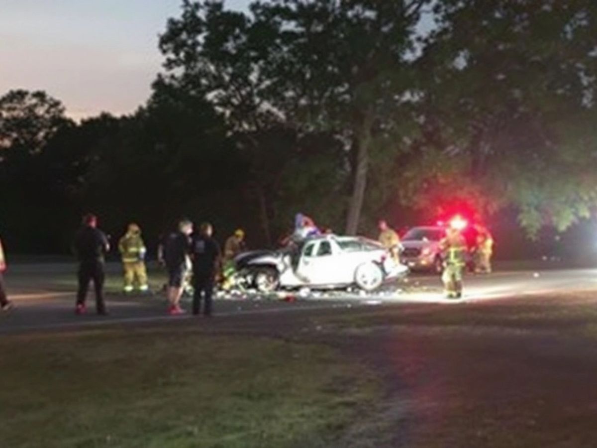 Damaged car on Route 3 with emergency responders nearby.