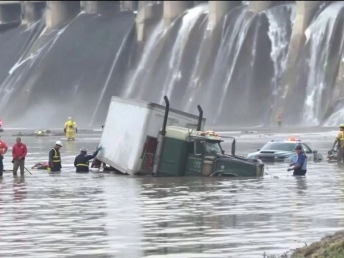 Truck crash at Greers Ferry Dam with emergency responders.