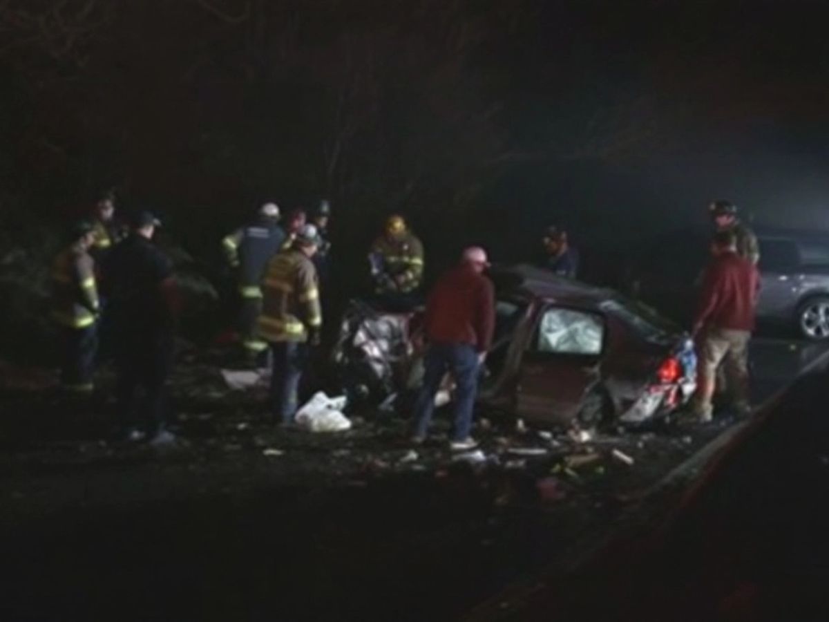 Emergency responders at a car accident scene in Groton.