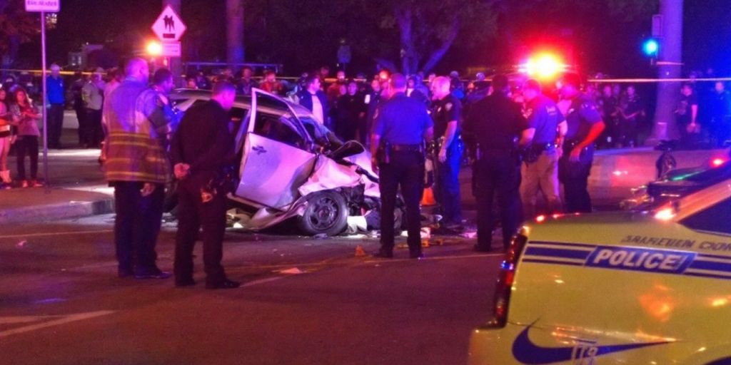 Damaged vehicle at a hit-and-run crash site.